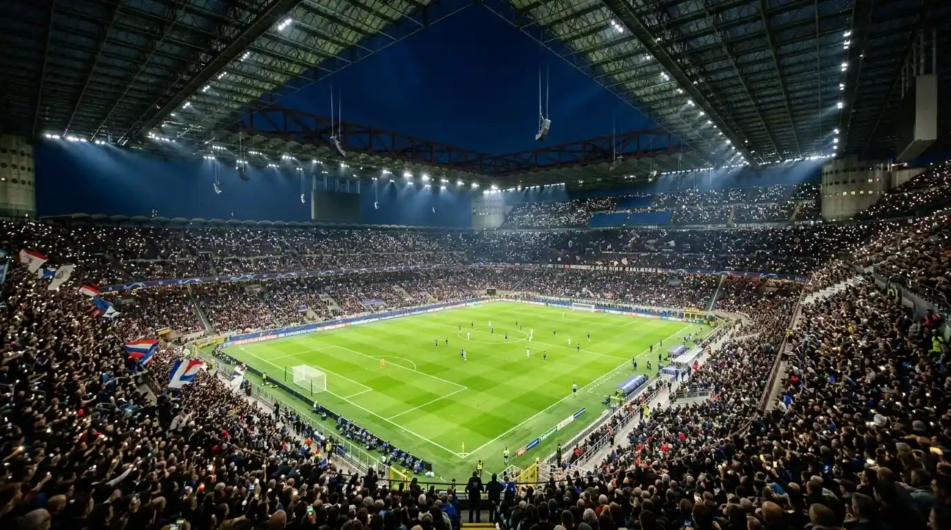 Estadio de fútbol europeo iluminado durante una noche de Champions League con las gradas llenas de aficionados